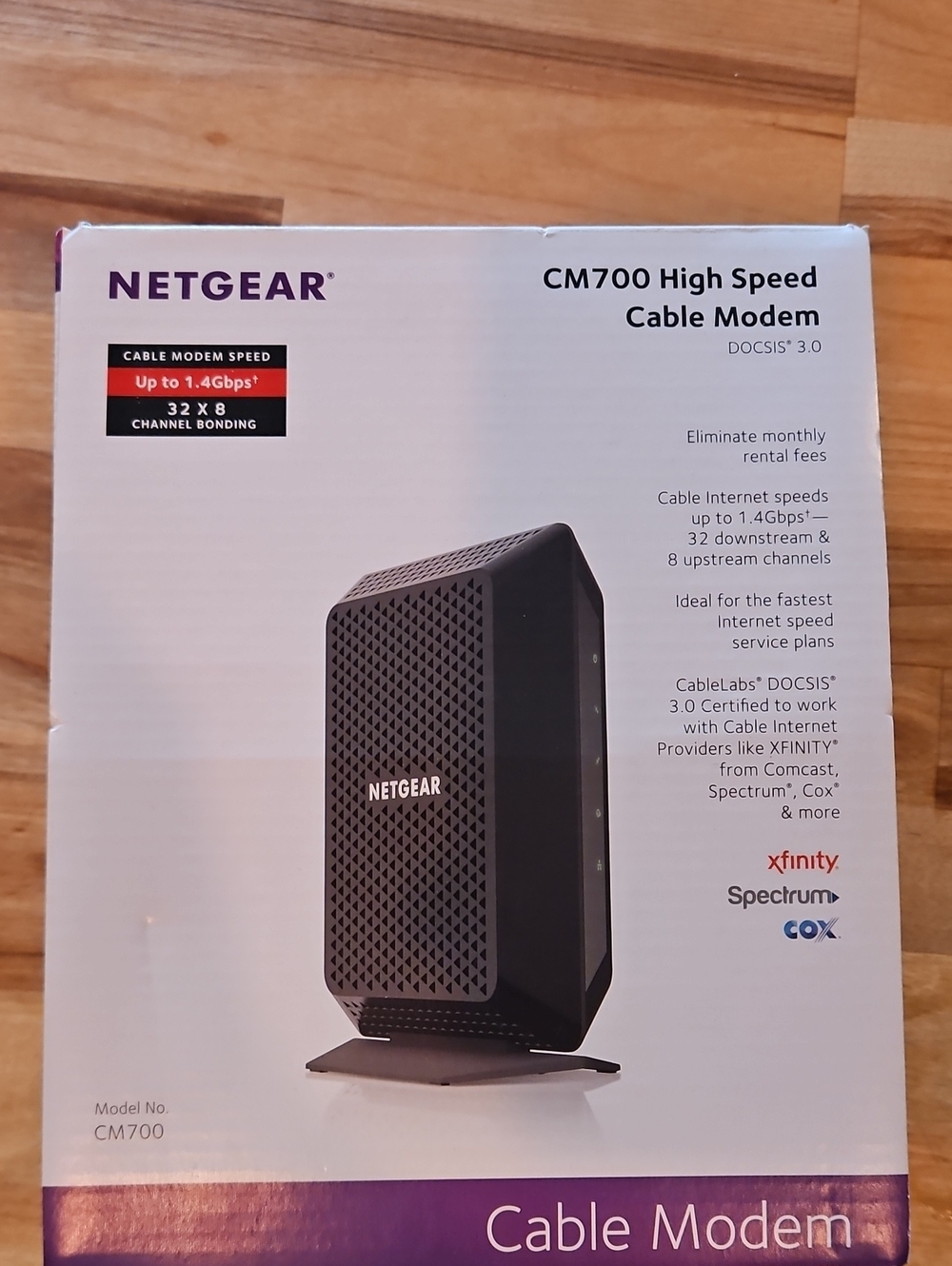 NETGEAR CM700 Black and Purple Cable Modem Box